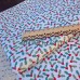Ткань хлопок c красными ягодами остролиста или падуба на белоснежном фоне. Подходит для создания елочных игрушек, сапогов, одежды для кукол, изделий в стиле пэчворк